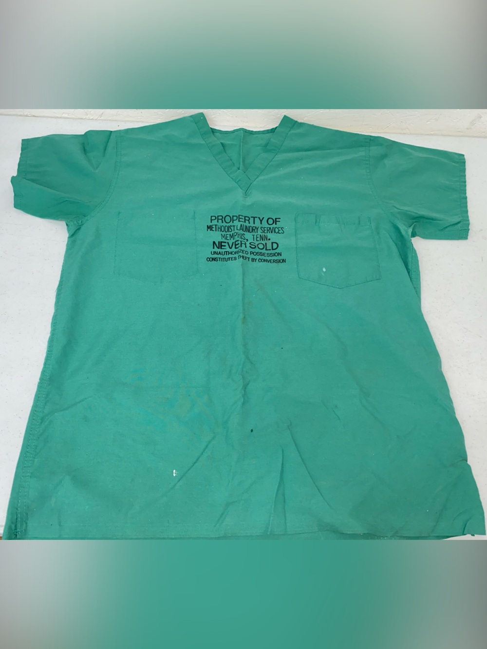 Green Scrubs Property of Methodist Laundry Services Memphis TN